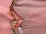 Lot 116 - A Valentino couture salmon-pink crêpe evening...