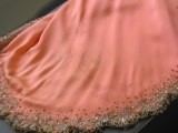 Lot 116 - A Valentino couture salmon-pink crêpe evening...