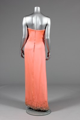 Lot 116 - A Valentino couture salmon-pink crêpe evening...