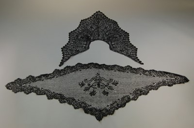 Lot 210 - A group of black bobbin lace, mainly Le Puy,...