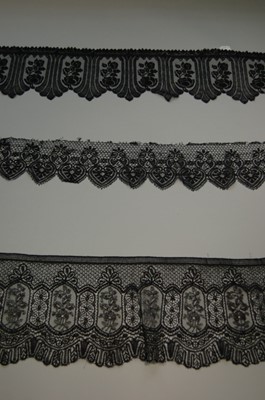Lot 210 - A group of black bobbin lace, mainly Le Puy,...
