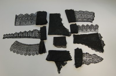 Lot 210 - A group of black bobbin lace, mainly Le Puy,...