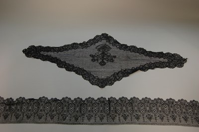 Lot 210 - A group of black bobbin lace, mainly Le Puy,...
