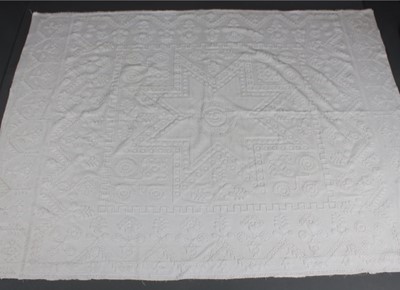 Lot 212 - A large white cotton 'roving' coverlet,...