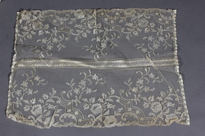 Lot 213 - A group of blonde silk bobbin lace, mid 19th...