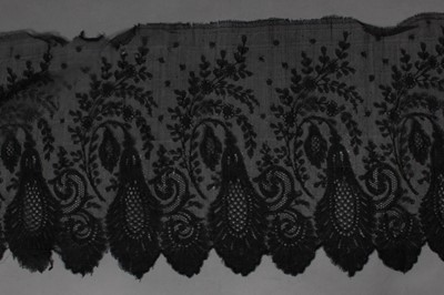 Lot 218 - A group of black Chantilly dress flounces and...