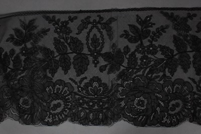 Lot 218 - A group of black Chantilly dress flounces and...