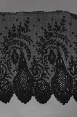 Lot 218 - A group of black Chantilly dress flounces and...