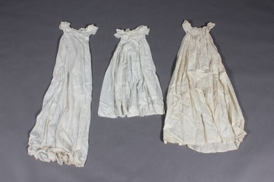 Lot 232 - A group of baby gowns and accessories, early...