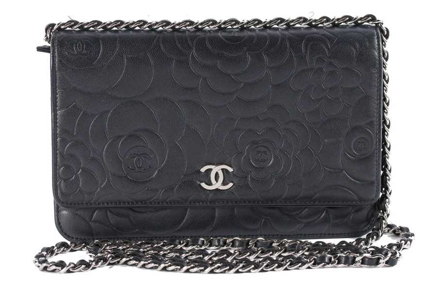 Lot 24 - A Chanel WOC of camellia-embossed black