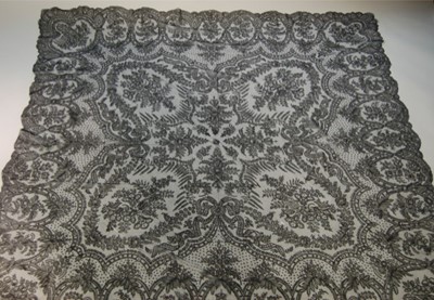 Lot 254 - Two black Chantilly lace shawls circa 1860,...