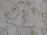 Lot 264 - An embroidered cradle cover, English, circa...