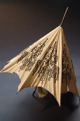 Lot 267 - A carriage parasol circa 1870, the ivory silk...