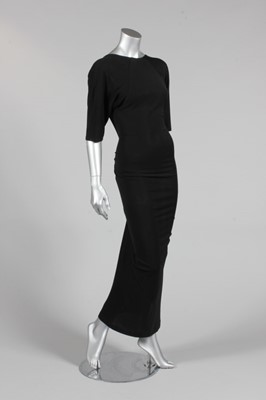 Lot 122 - A Julio black jersey evening gown, 1980s,...