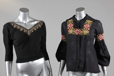 Lot 133 - A group of blouses, sweaters and cardigans,...