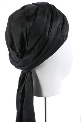Lot 109 - A Jeanne Lanvin black satin turban, circa 1920,...