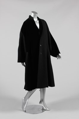 Lot 19 - A Commes des Garcons navy velvet and wool coat,...