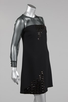 Lot 164 - A Givenchy couture black crepe mini dress, mid...