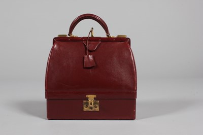 Lot 168 - An Hermès ox-blood leather malette bag, 1950s,...