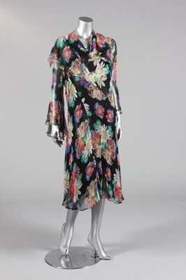 Lot 171 - A printed chiffon garden party dress, circa...