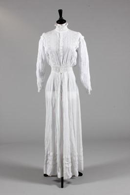 Lot 177 - An ivory lawn summer dress, circa 1910,...