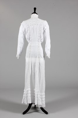 Lot 177 - An ivory lawn summer dress, circa 1910,...
