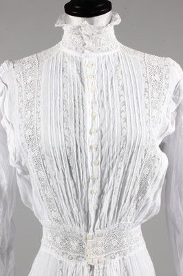Lot 177 - An ivory lawn summer dress, circa 1910,...