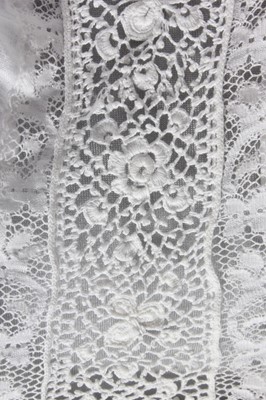 Lot 177 - An ivory lawn summer dress, circa 1910,...