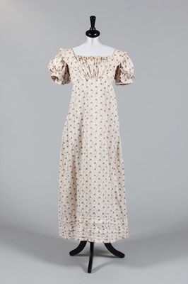 Lot 192 - A cotton printed cotton day dress, circa 1820,...