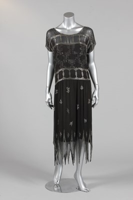 Lot 318 - A beaded black georgette evening gown, in the...