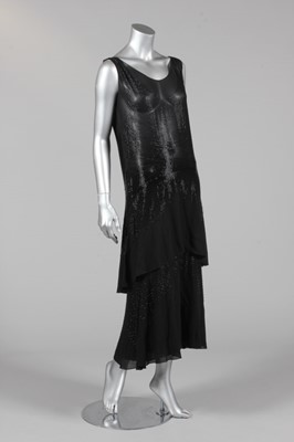 Lot 299 - A good beaded black chiffon cocktail dress,...