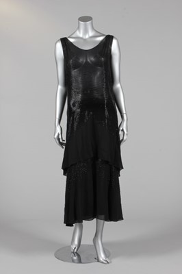 Lot 299 - A good beaded black chiffon cocktail dress,...