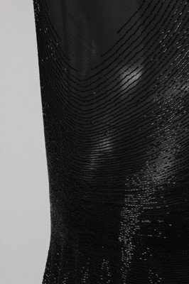 Lot 299 - A good beaded black chiffon cocktail dress,...