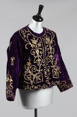 Lot 24 - An embroidered purple velvet jacket, Ottoman,...