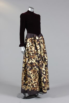 Lot 312 - A Nina Ricci wine velvet and brown moire ball...