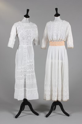 Lot 323 - A white muslin summer dress, circa 1910-14,...