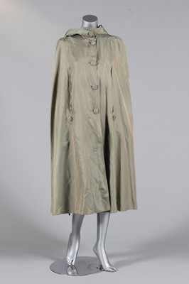 Lot 347 - A Burberry's Paris green silk cape, circa 1910-...