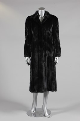 Lot 361 - A dark brown/black mink coat, 1980s, lined in...