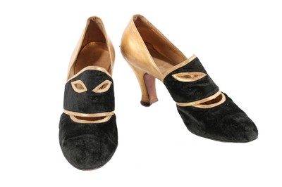 Lot 120 - A pair of Saks 'Masquerade' shoes, after André...