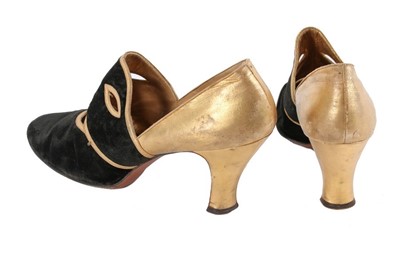 Lot 120 - A pair of Saks 'Masquerade' shoes, after André...