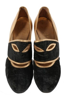 Lot 120 - A pair of Saks 'Masquerade' shoes, after André...