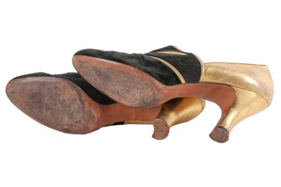 Lot 120 - A pair of Saks 'Masquerade' shoes, after André...