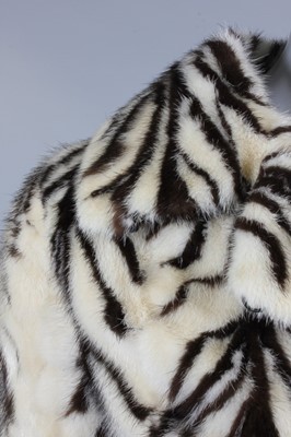 Lot 367 - An Intarzia mink coat, 1960s, labelled 'Pels...