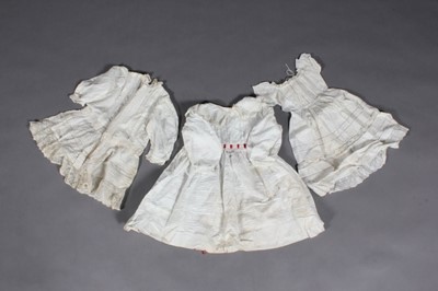 Lot 382 - An 1860s white muslin summer dress and a group...