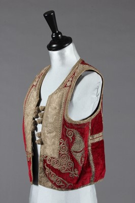 Lot 394 - An embroidered red velvet bolero, Balkan, late...