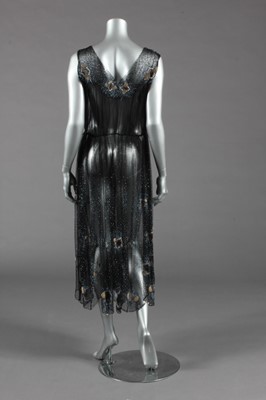 Lot 402 - A pretty black tulle tunic or over-dress,...