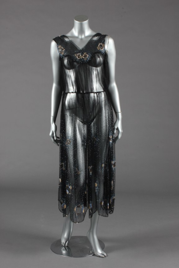 Lot 402 - A pretty black tulle tunic or over-dress,