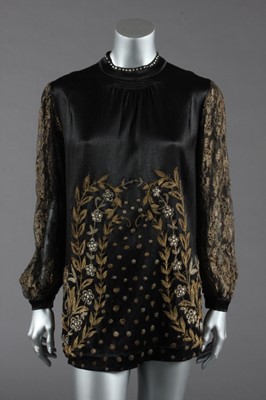 Lot 406 - The bias-cut ivory satin bridal gown and brown...