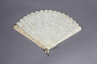 Lot 409 - A finely carved and pierced ivory brise fan,...