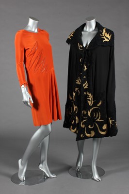 Lot 435 - An orange crepe de chine day dress, circa 1928,...